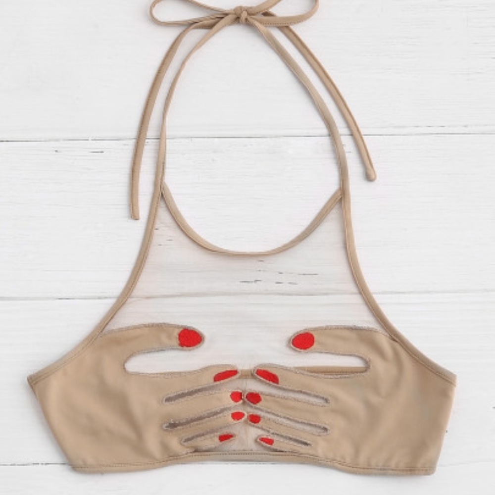 Hand holding Bra